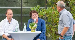 Martin Kaiser, Sabine Riewenherm und Jürgen Vogt (v.l.n.r.) auf dem Podium