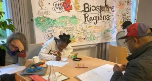 Die Abbildung zeigt die Teilnehmer einer Mini-Konferenz