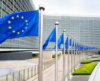 European flags in front of the Berlaymont building in Brussels.