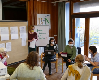 Personen bei der Tagung