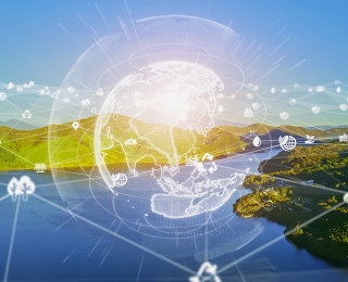 Grafische Weltkugel in einer natürlichen Umgebung mit Fluss und Landschaft